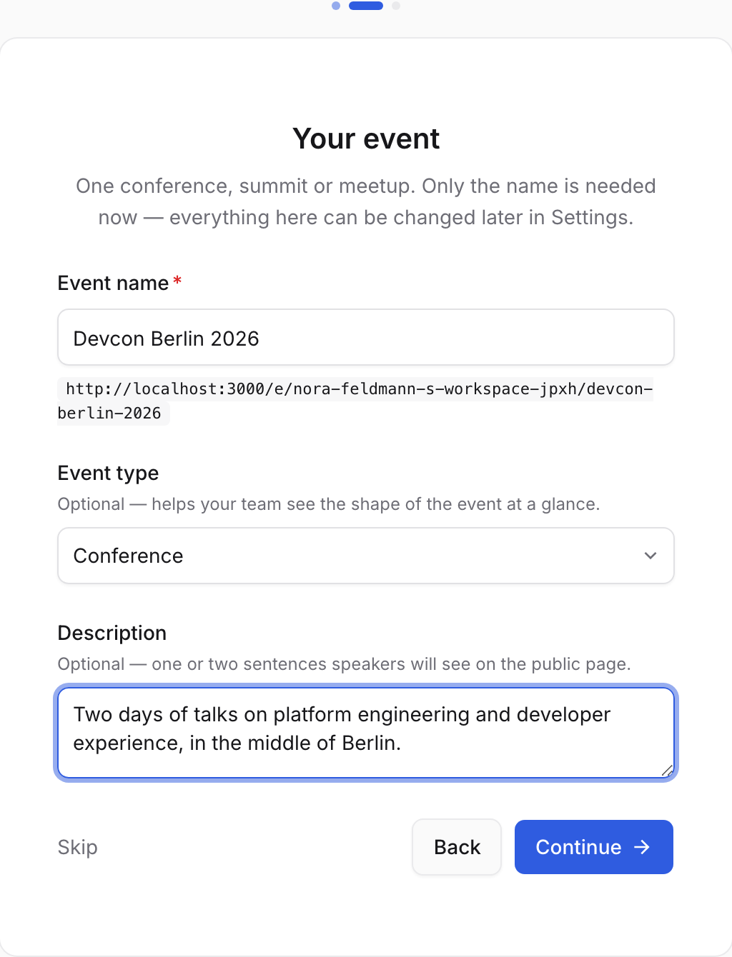 The second onboarding screen: event name Devcon Berlin 2026, its public address, an event type of Conference and a short description