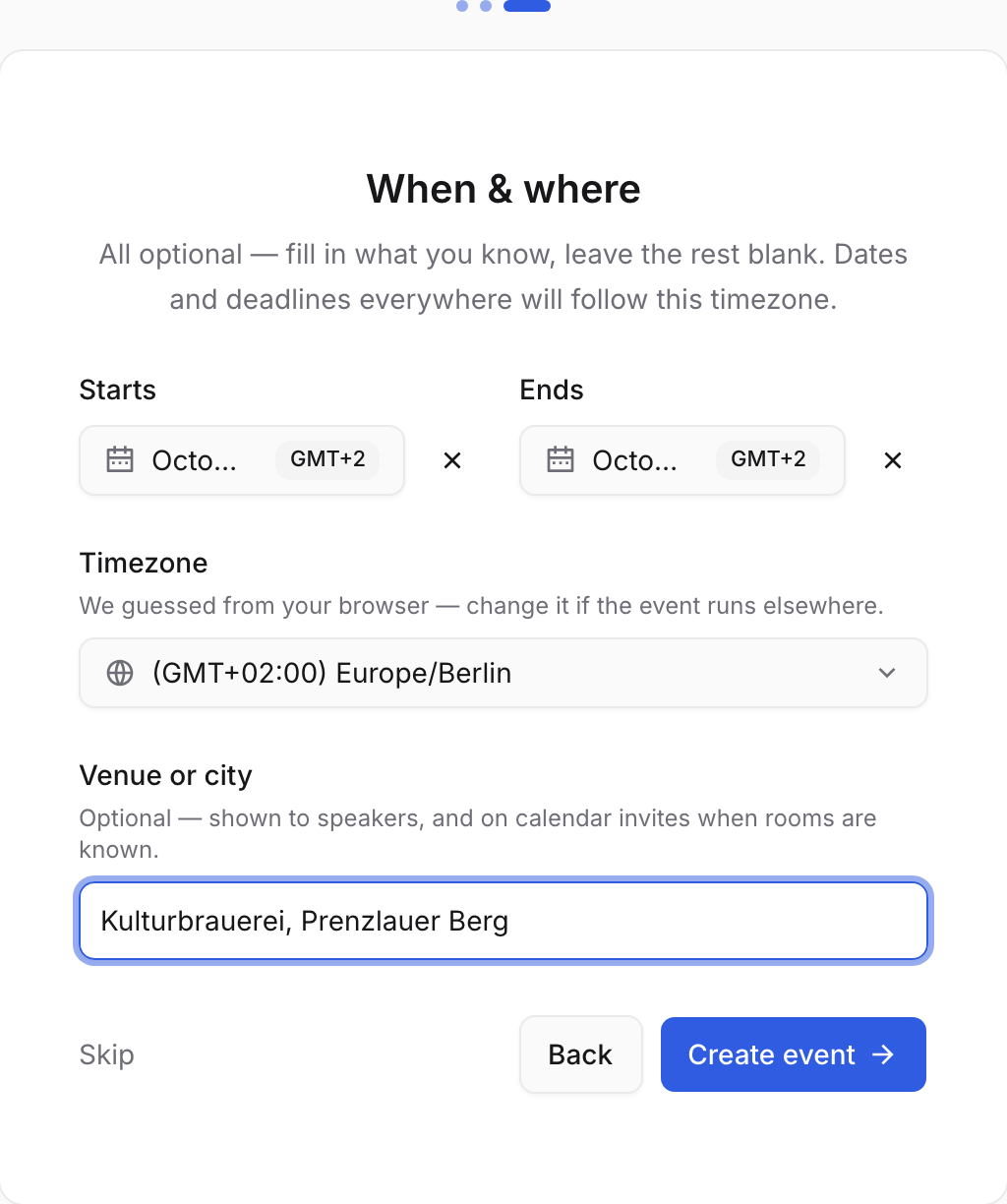 The third onboarding screen: start and end dates, the Europe/Berlin timezone and a venue