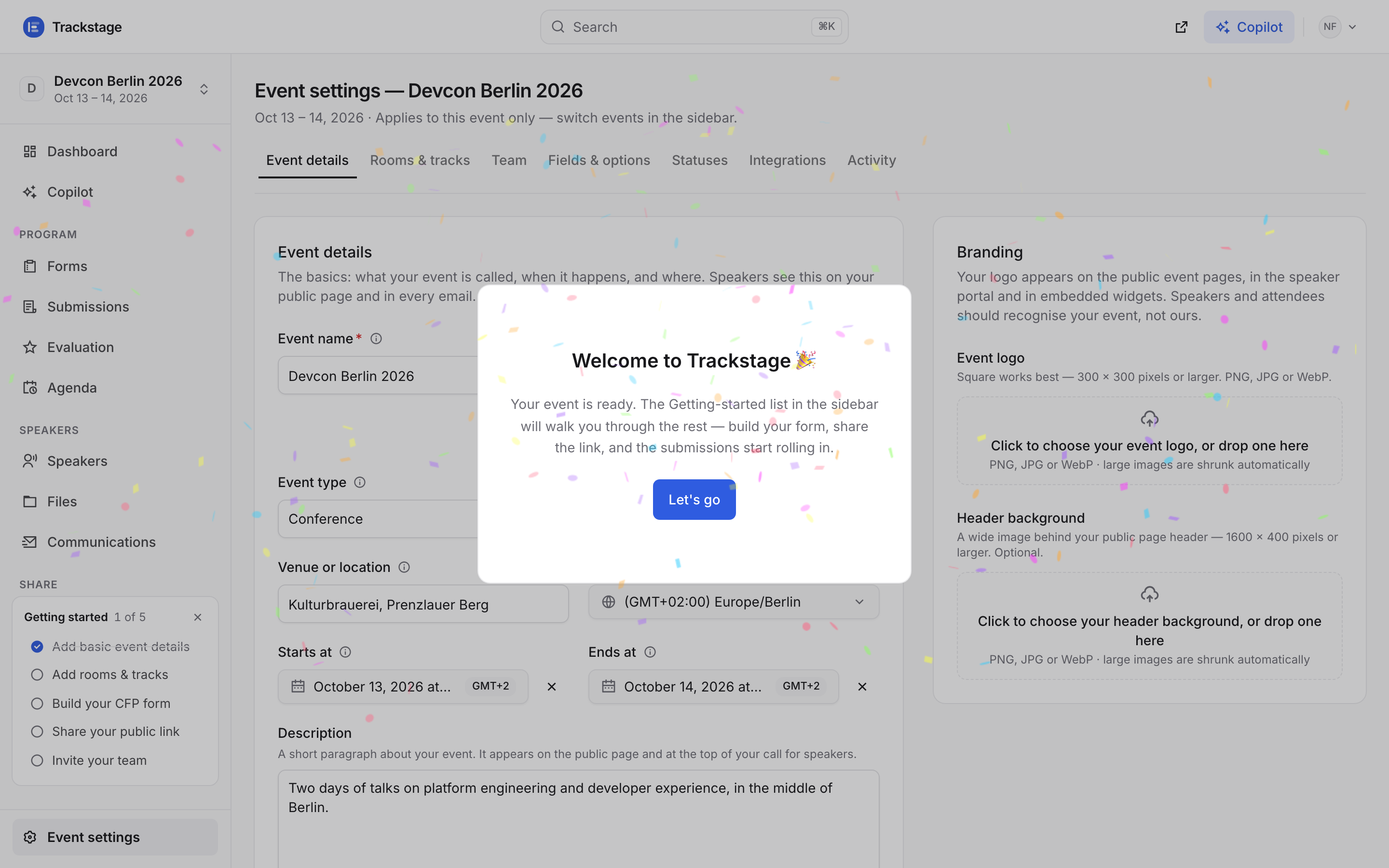 The Trackstage app with a welcome card and confetti over the new event's settings page