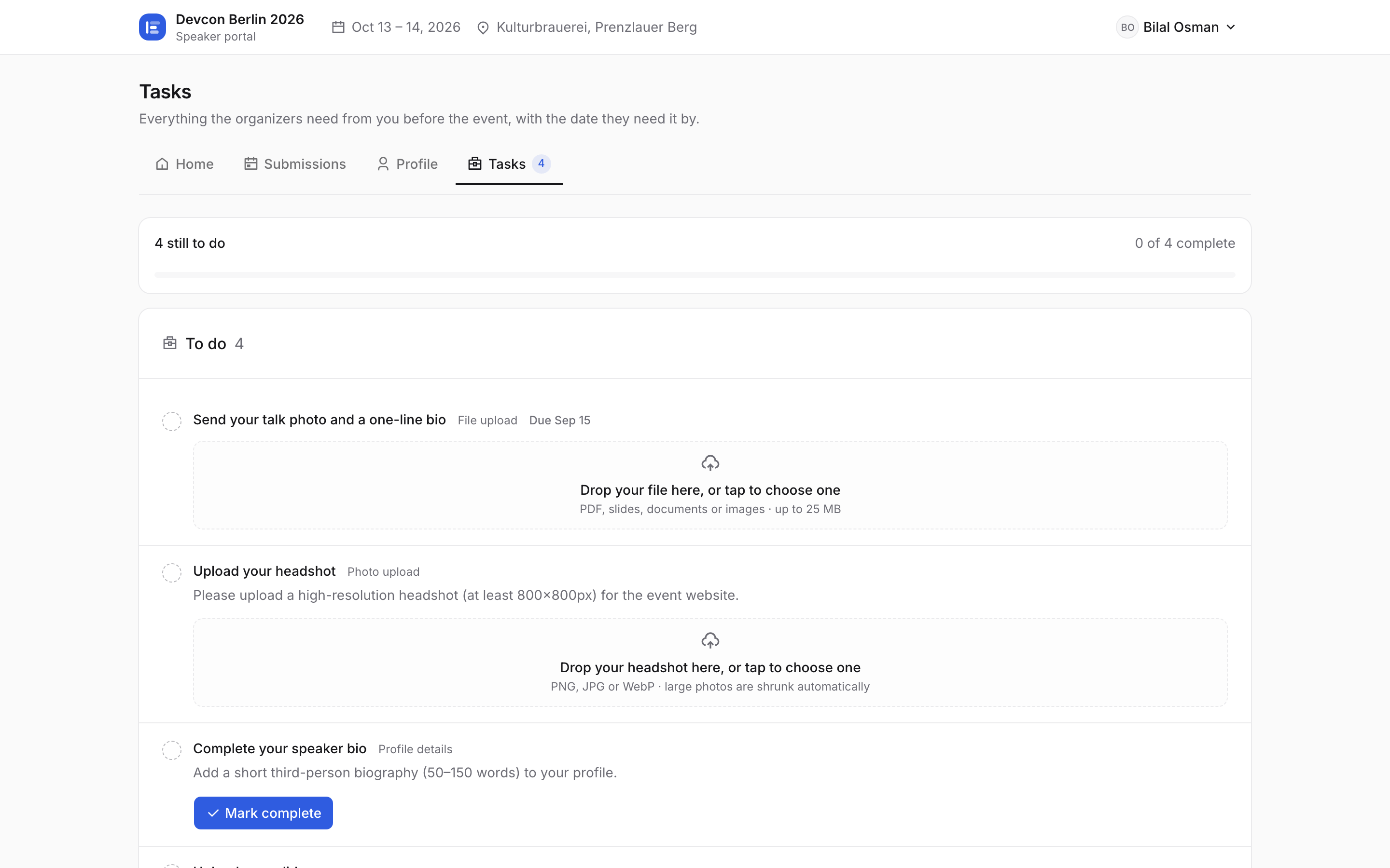 The speaker portal Tasks tab: the task the organizer assigned, plus the three onboarding tasks acceptance created
